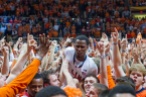 Illinois' D.J. Richardson (1) celebrates amongst a sea of Illinois fans who rushed onto the court after the game at the Assembly Hall on Thursday, Feb. 7, 2013. (Daryl Quitalig/Midway Madness)